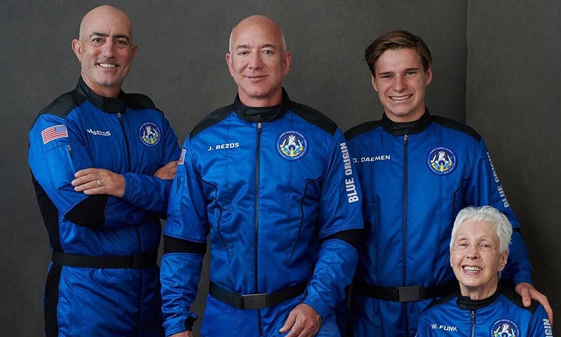 Jeff Bezos, world's richest man, rides his own rocket to space